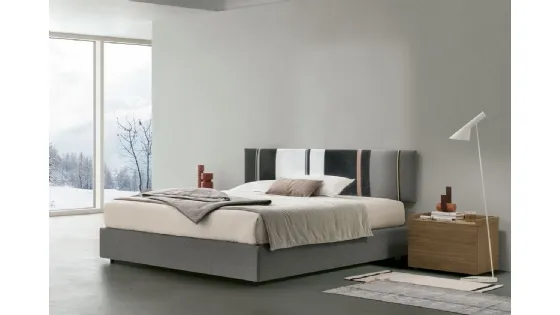 Letto sommier Diagonal con box contenitore e pannello testiera di Tomasella